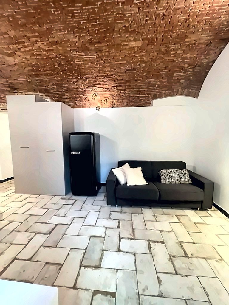 Le canapé-lit dans l'espace de vie · Perla del Borgo, Borgio Verezzi